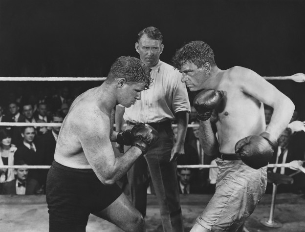 Two men boxing in ring