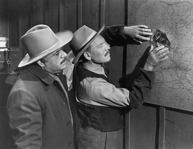 Men looking at map